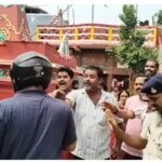 Dispute over the barricading of the temple complex leads to a clash between two groups; several injured, police deployed in the area.